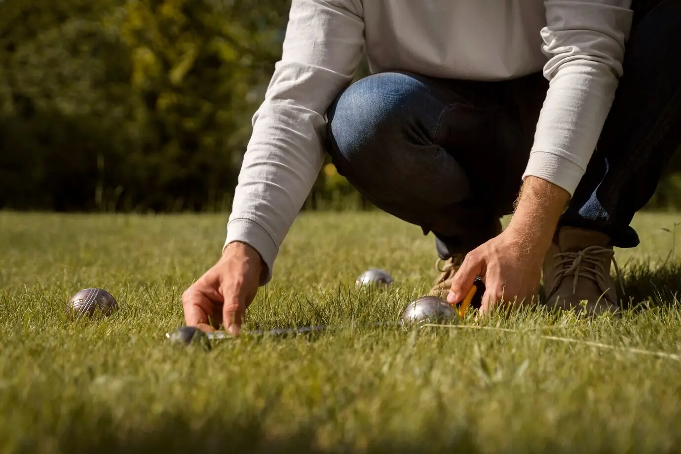 Side view of a man measuring distance